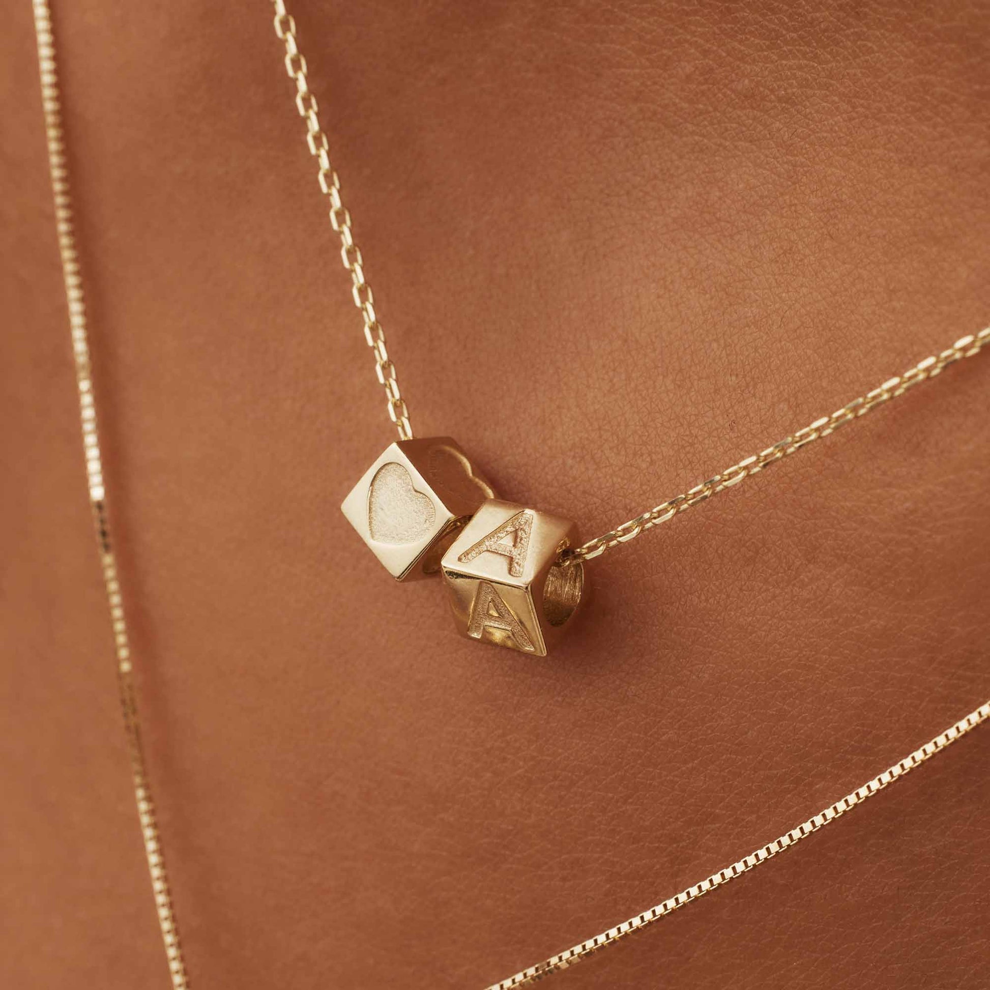 Isabel Bernard Le Carré Felie 14 Carat Golden Initial Charm cube IB340043